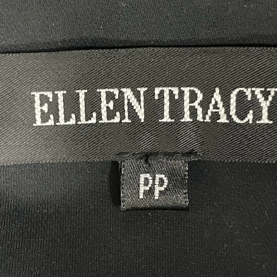 Chaqueta cortavientos clásica con cuello abotonado negra Ellen Tracy talla PP Foto 3 de 4