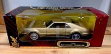 Road Signature Gold 1966 Oldsmobile Toronado 118 Scale Diecast Model Car 92718 Road Signature Gold 1966 Oldsmobile Toronado 118 Scale Diecast Model Car 92718
