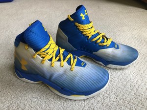 blue and yellow basketball shoes