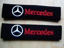 PAIR OF NEW EMBROIDERED "MERCEDES" SEAT BELT COVERS,  FITS ALL,FREE TRACKED POST