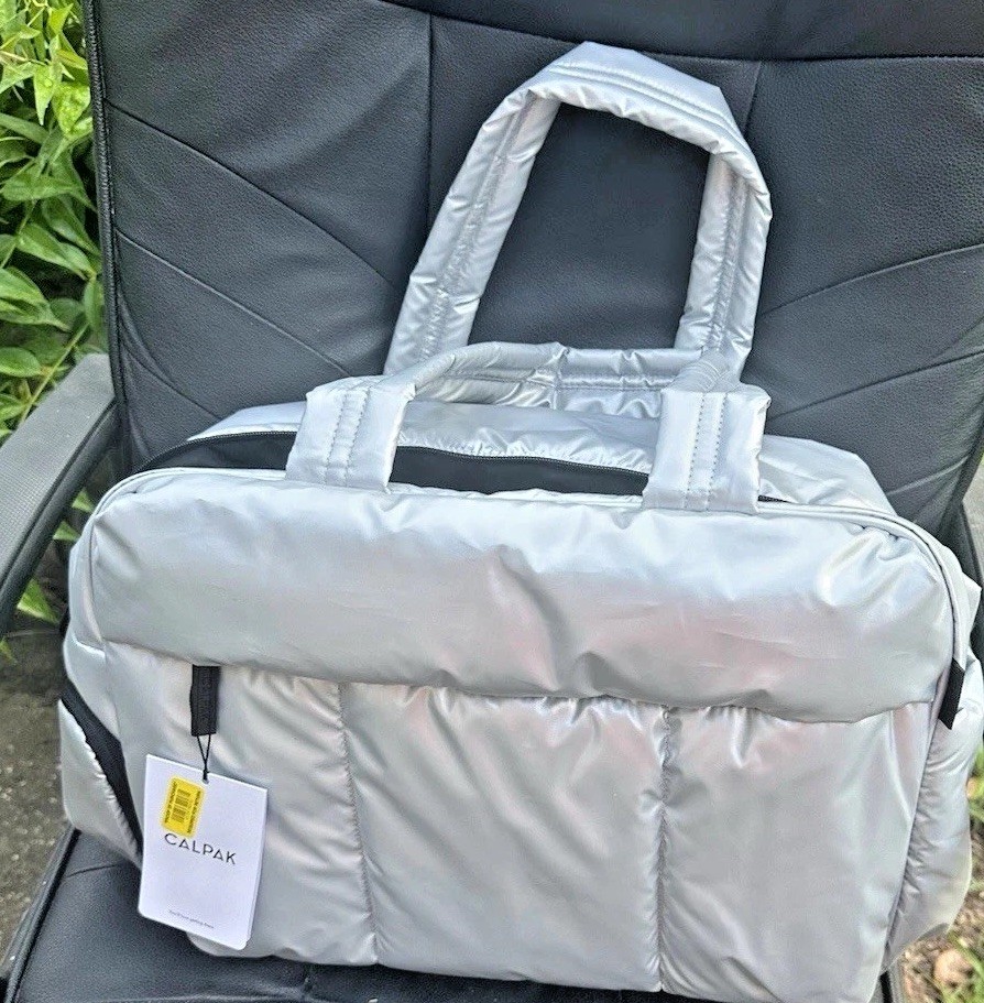 Calpak Luka Duffel Bag 25L With Pockets Rare Metallic Silver color NWT