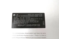 BMW “ Year One of the 1 ” Hardcover Book and Three Booklets (One VIN)  - All NEW