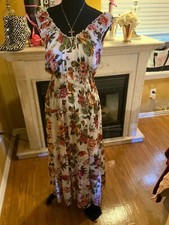 Floral print tiered elastic waist dress . Style timeless and versatile