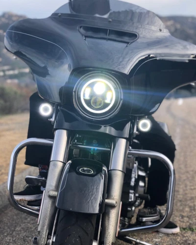 Faro LED 7 pulgadas 100 W negro con ojos angulares halo + soporte para Harley Davidson Foto 2 de 4