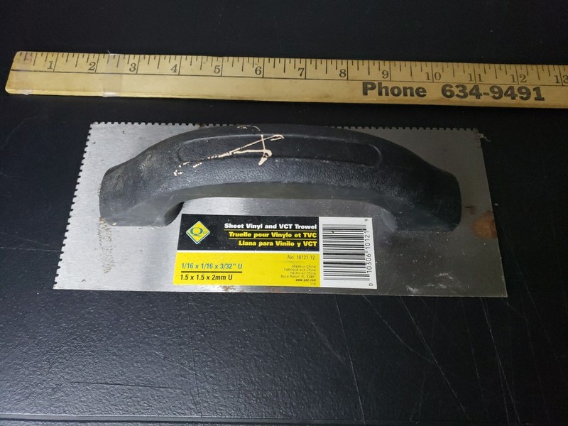 QEP sheet vinyl and VCT Trowel with a 1/16" x 1/16" x 3/32" U-notch blade