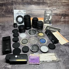 Lot Of Different Types Of Camera Lenses And Accessories