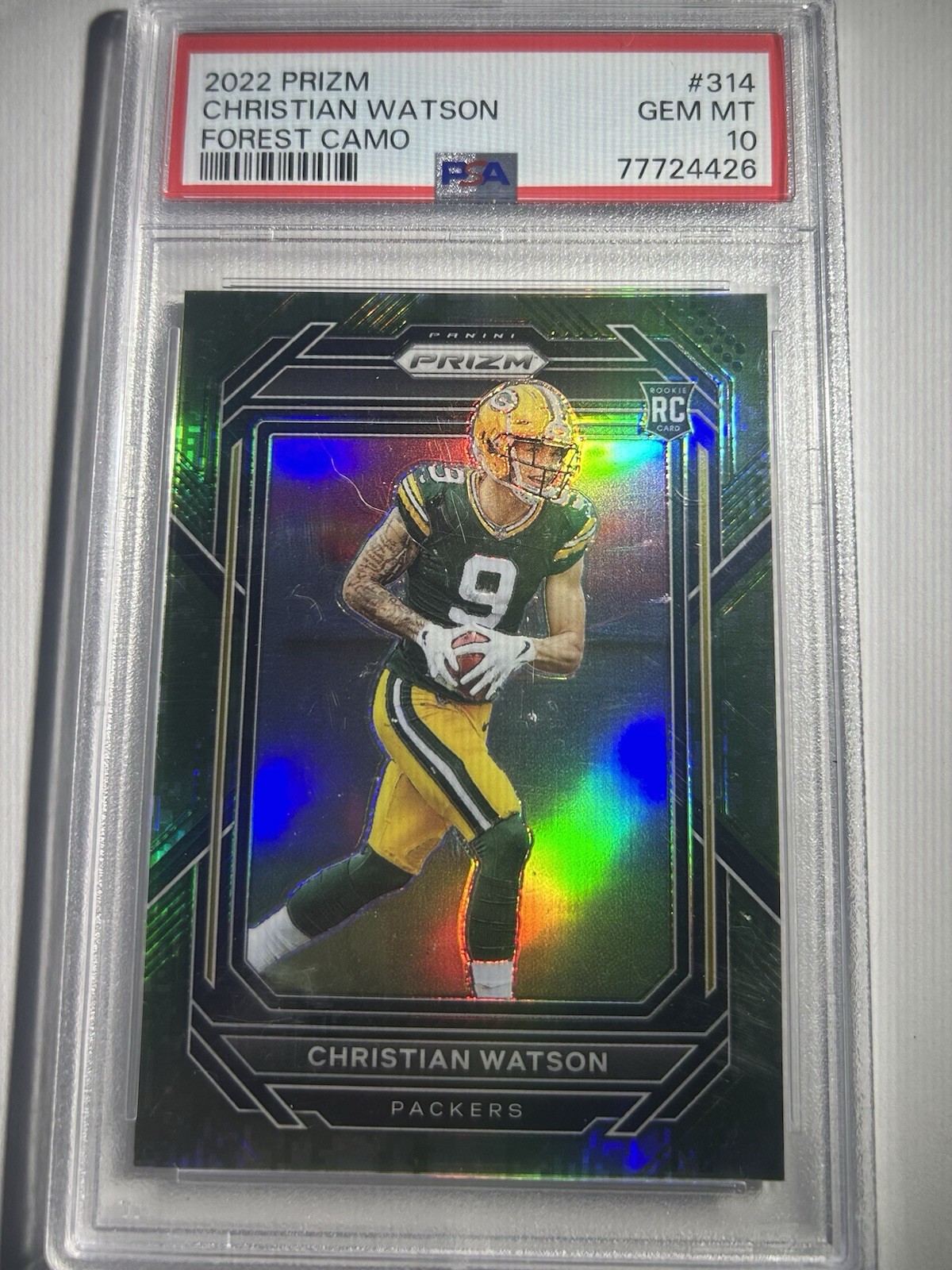 2022 Panini Prizm Rookies Christian Watson #314 Forest Camo Prizm /15 (RC)