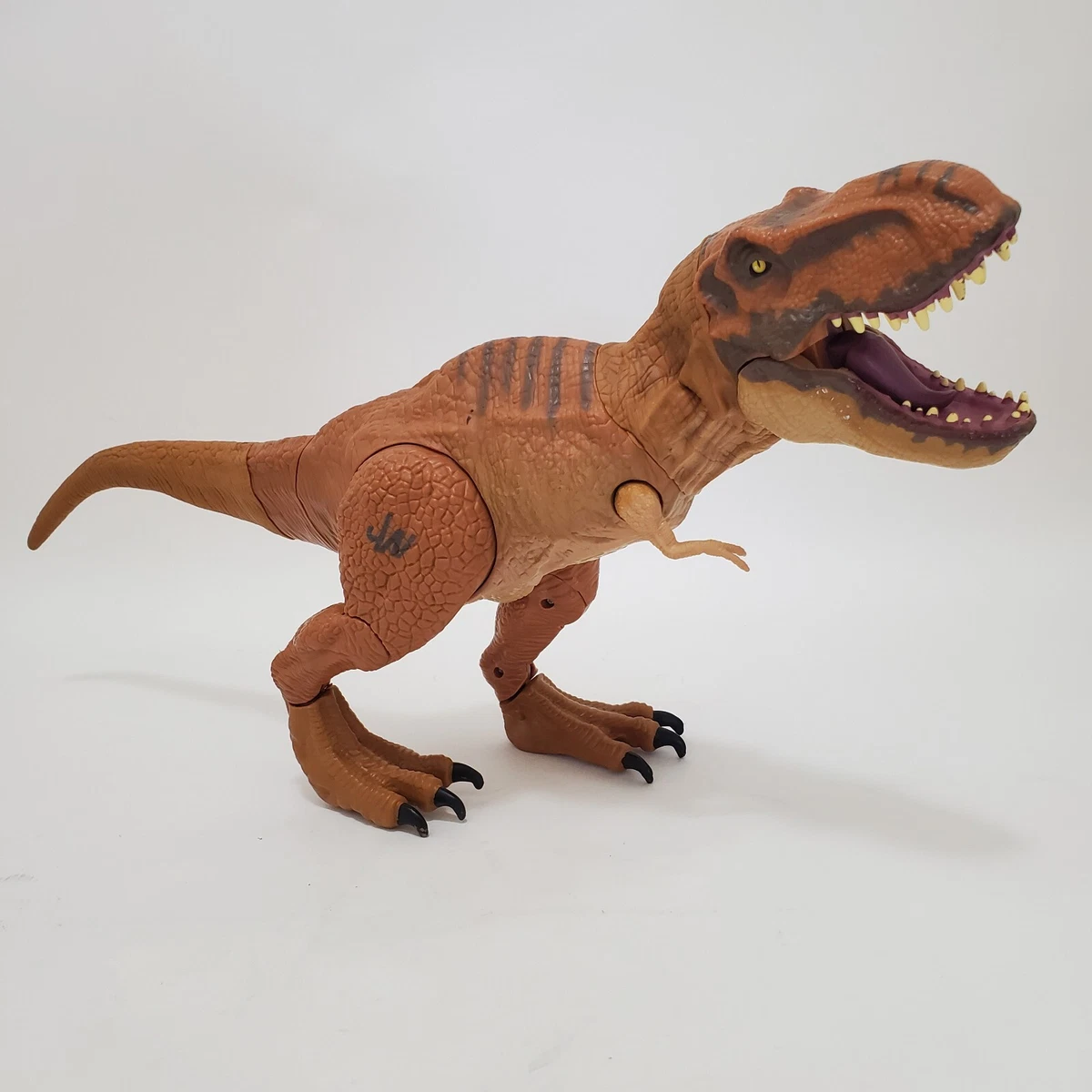 Dinosaure articulé Jurassic World T-Rex - frappe et dévore avec le