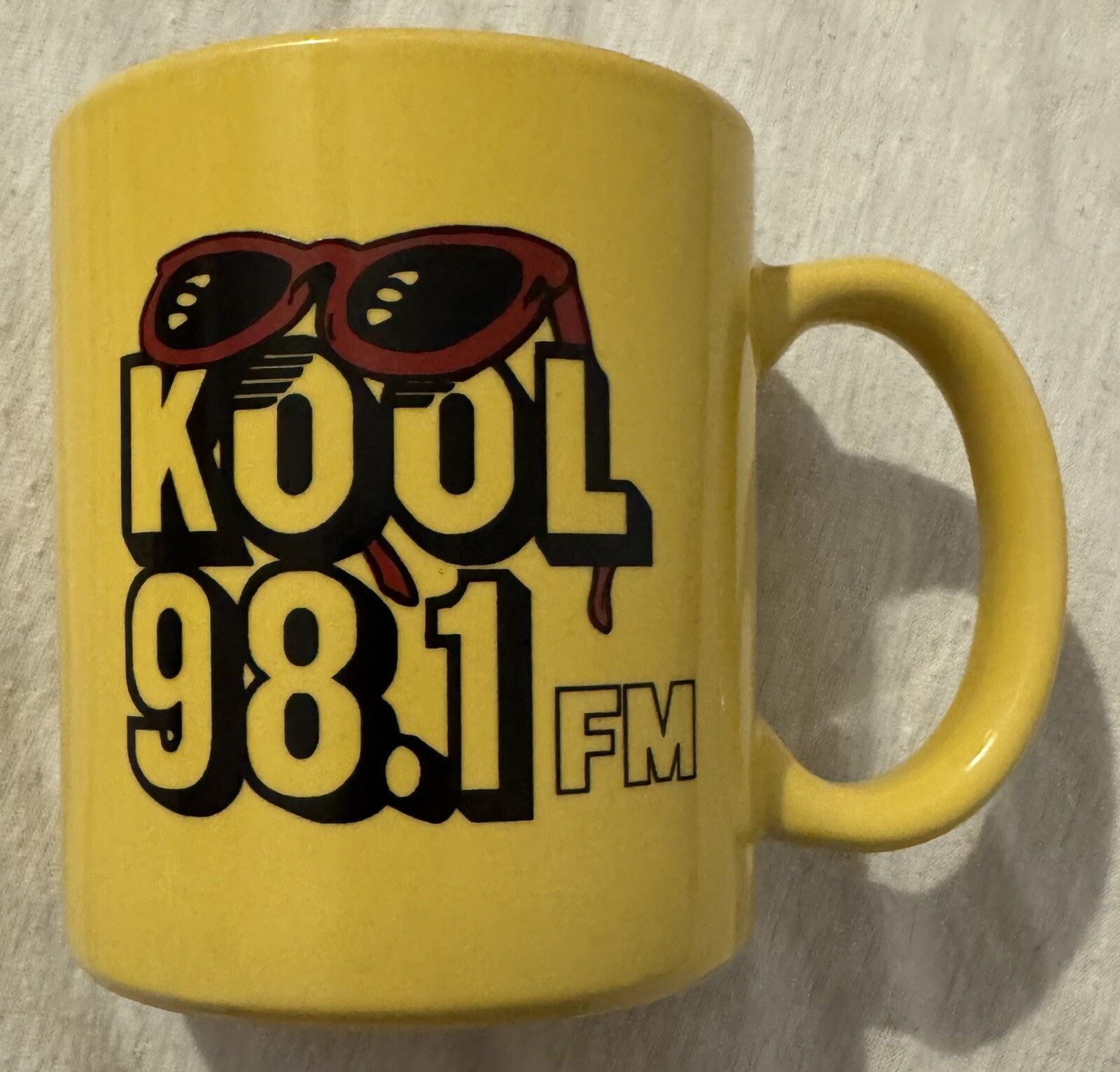 Vintage KOOL 98.1 FM Logo Coffee Mug Radio Station KKCL Lubbock Texas Sunglasses