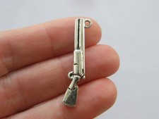 4 Shotgun gun pendants antique silver tone G99