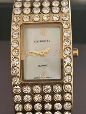 Kim Rogers Gold Tone Crystal Wristwatch Women's Iridescent Face Analog