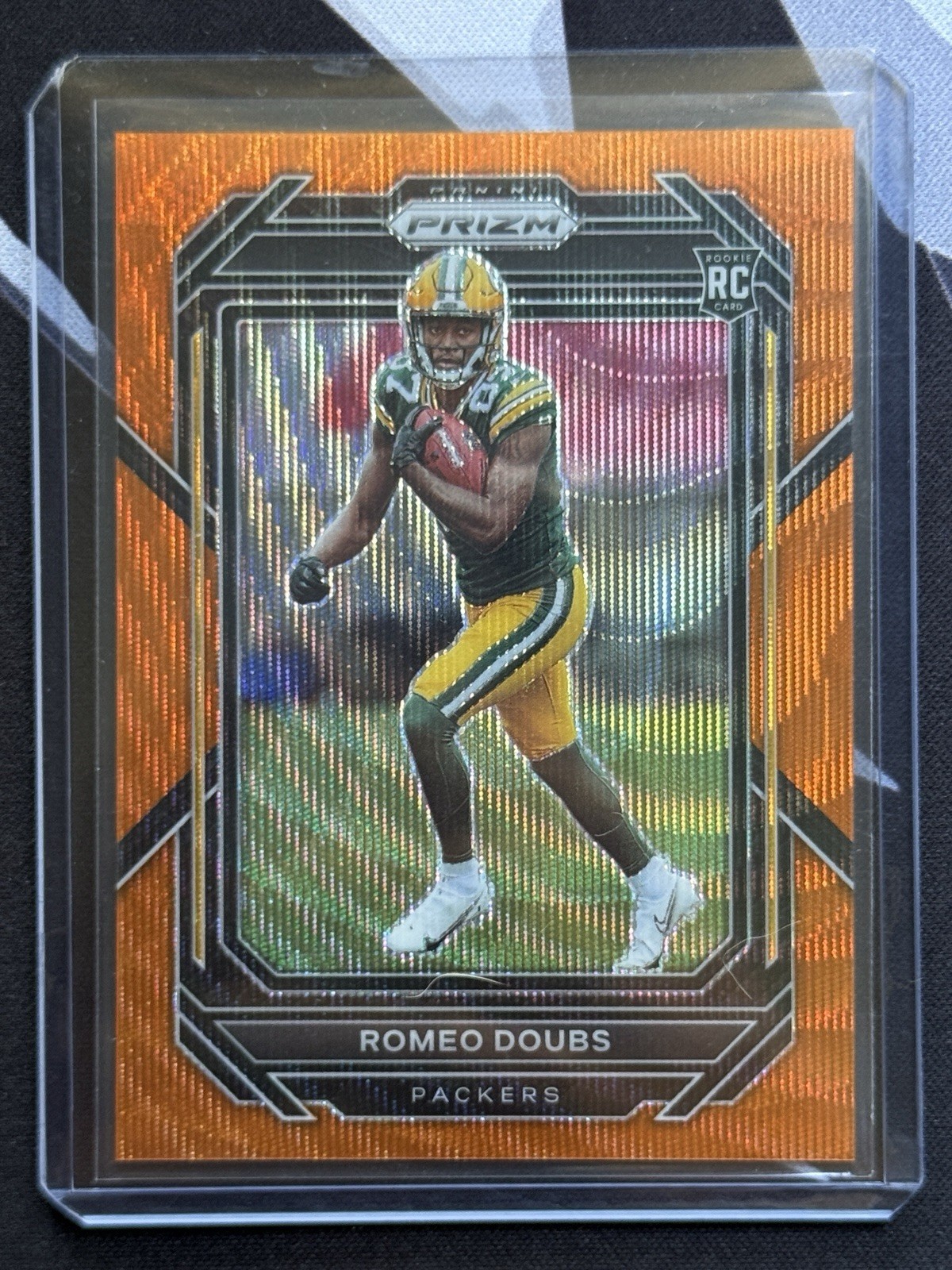 2022 Panini Prizm Romeo Doubs Orange Wave /60 #337 Patriots RC