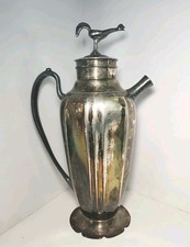 A sterling silver rooster cocktail shaker by Bernard Rice & Sons — silversmith-crafted barware with genuine heirloom drama.