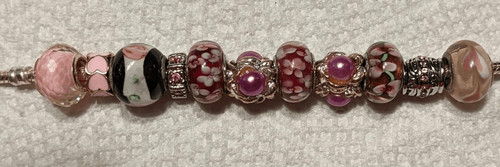 SET OF 12 ASSORTED PINK/SILVER BRACELET BEADS/CHARMS