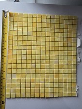 sheet of yellow glass mosaic tiles