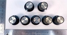 Set of 7 black guitar or amp knobs-1950s/1960