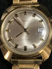 Vintage Timex Date Electronic Wrist Watch Gold Tone Silver Face 1970’s 36mm