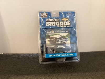 AUTO-WORLD XTRACTION HO SLOT CAR 1962 CHEVY IMPALA CONV. (BLACK)