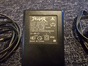 Atari Jaguar Console With DOOM Game.