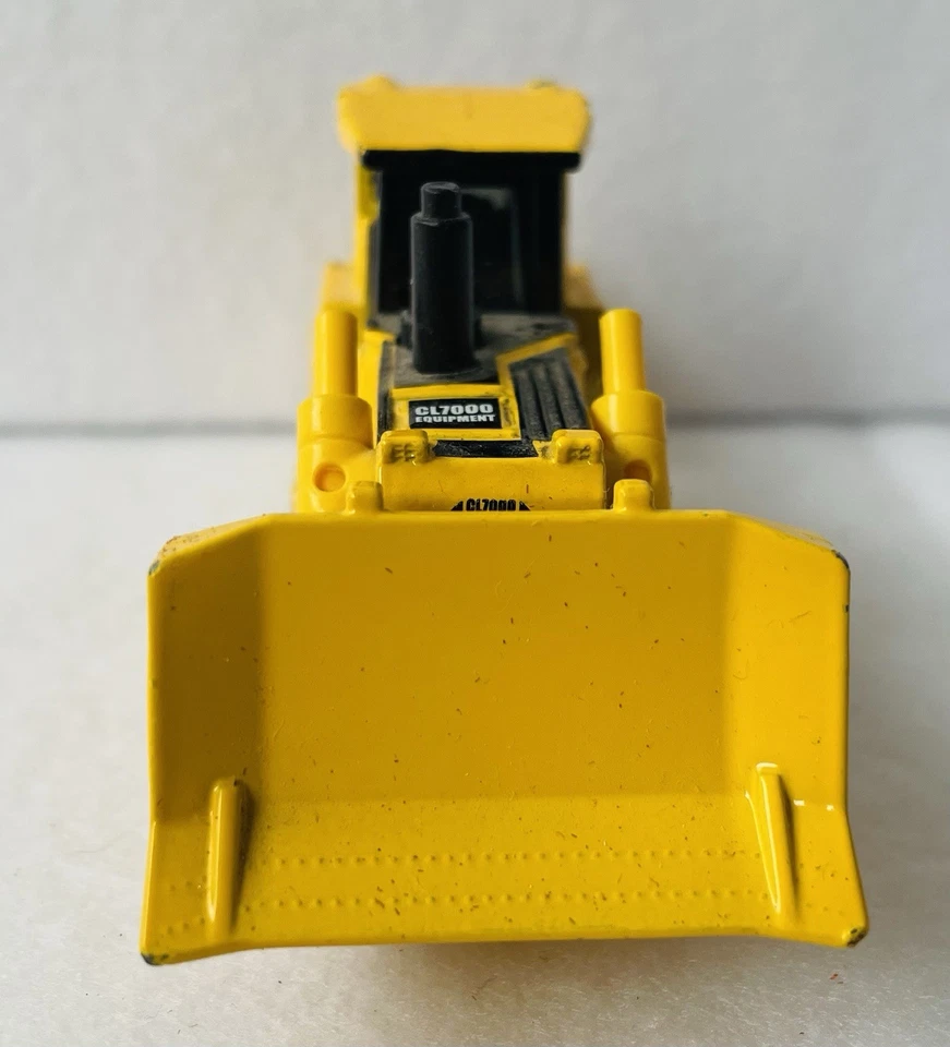 Bulldozer Matchbox Real Working Rigs CL7000 en amarillo (2008, RW009, 9 cm) - En muy buena condición Foto 3 de 4
