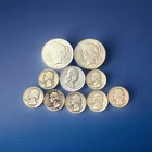 Lot Of 90% Silver. $4.25 Face Value. Peace Dollars In AU Condition.