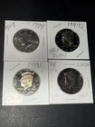 Lot Of 4 Kennedy Half Dollar Coins 1995 1997s 1998s 2003s Toned & Camo Proof