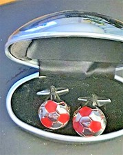 360 - Nice pair of Football cuff-links. Comes in a sliver case.
