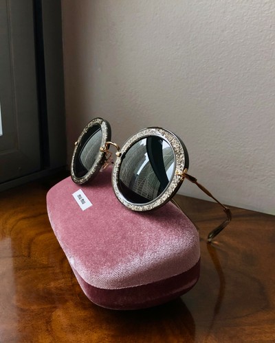 miu miu round oval sunglasses