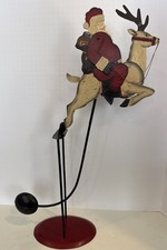 Vintage Rocking Santa Reindeer Pendulum Rocking Iron Toy On Stand Folk Art