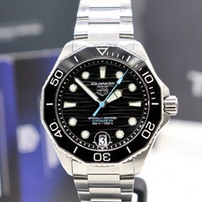 Tag Heuer Aquaracer auto COSC certified watch 42mm near mint Tag warranty 2029