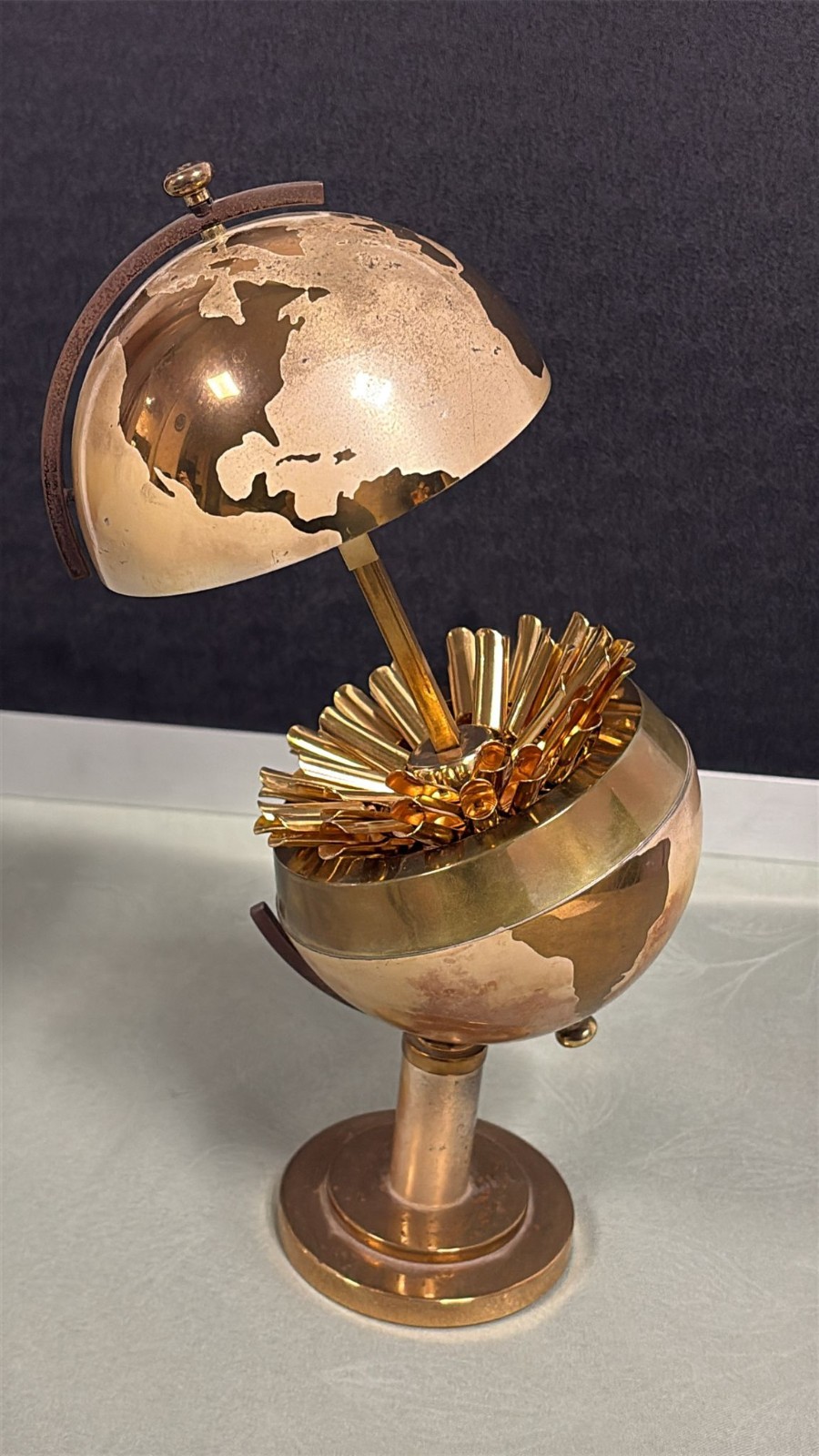 VINTAGE MID 1900'S FLOWERY GLOBE SHAPED BRASS CIGARETTE HOLDER