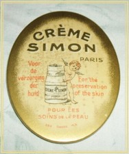 Crème Simon1900 Miroir ancien ovale 1920 angelot rehaussé OR dimensions 7x5,5cm