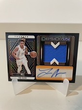 2021-22 Panini Obsidian Jersey Electric Etch Orange /35 Tre Mann Rookie Auto RC