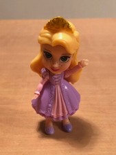 Figurine mini poupée princesse Raiponce Disney Jakks Pacific robe violette 9 cm