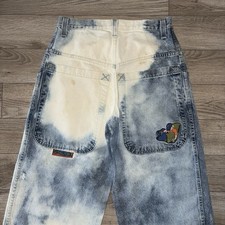 90s JNCO Slackers blue jeans with bleach stains and distressing