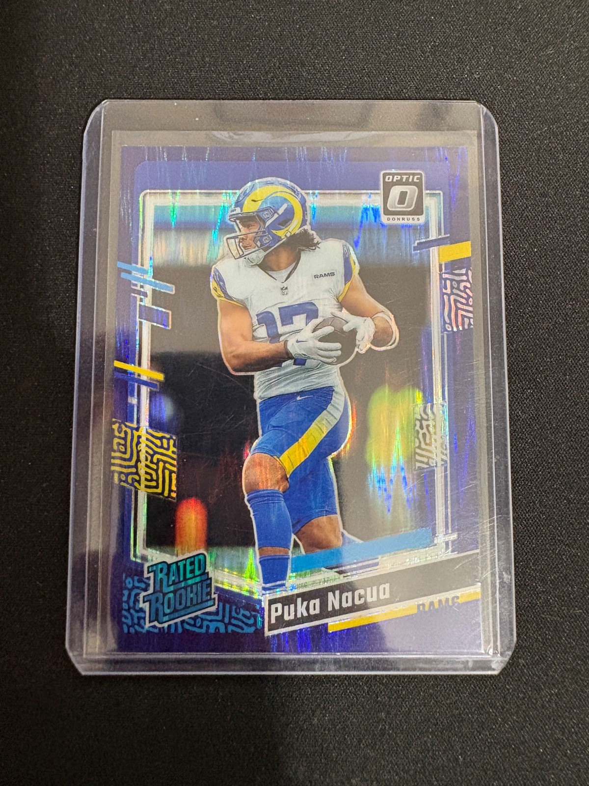 2023 Panini Donruss Optic - Rated Rookie Puka Nacua #238 Purple Shock Prizm (RC)