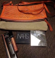  Stella & Dot Orange Color Bag  With Lot Of Makeup Some Defects.
