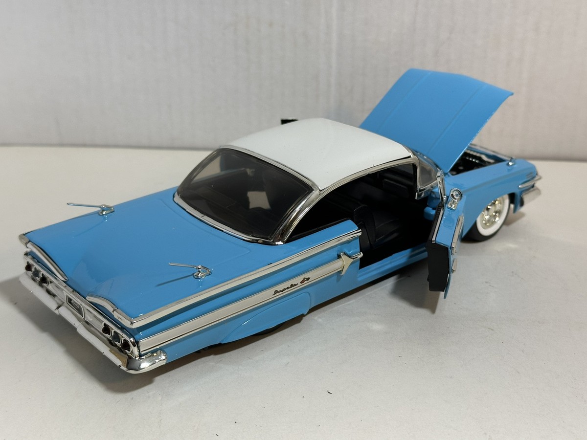 JADA SHOWROOM FLOOR 1960 CHEVY IMPALA BLUE 1:24 DIECAST MODEL CAR