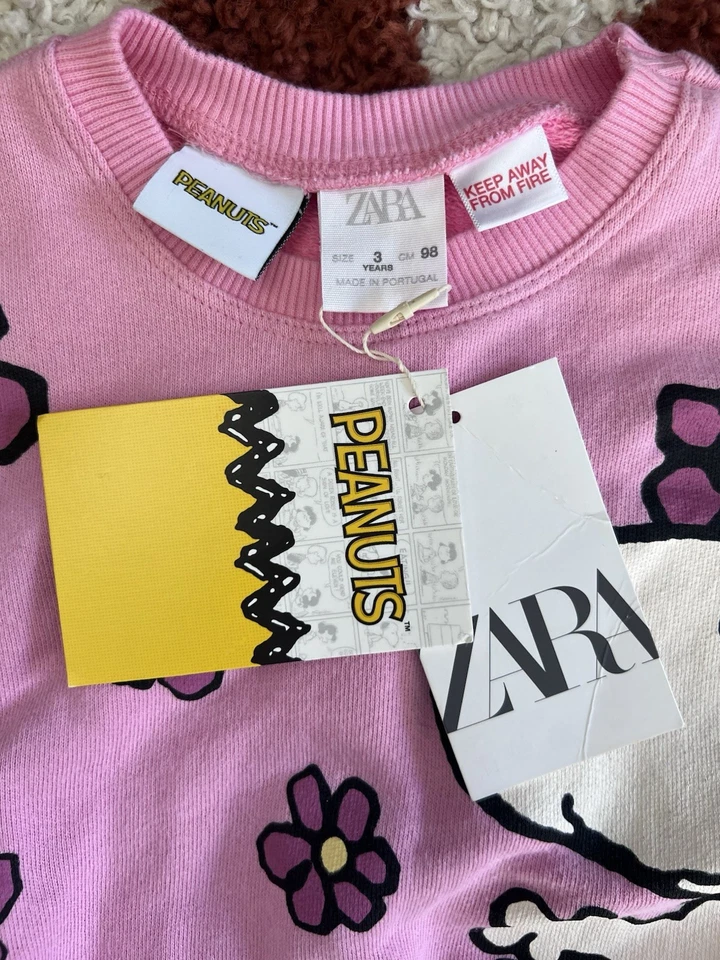 Suéter con gráfico de cacahuetes rosa de Zara para niños Foto 2 de 4