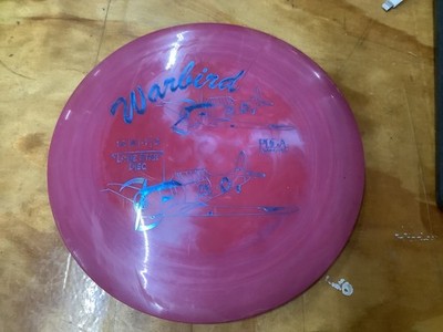 Lone Star disc Alpha Warbird  175 gram golf disc swirly