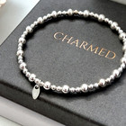 STERLING SILVER STRETCH STACKING BRACELET WITH 3-5MM STERLING SILVER BEADS 925