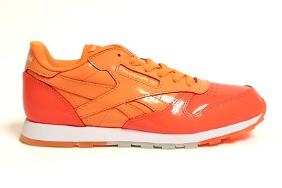 orange and white reebok classics