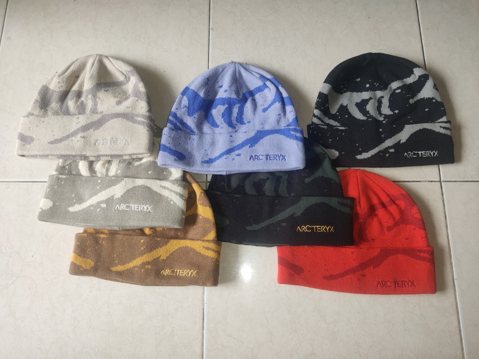 ARC'TERYX GROTTO TOQUE rosso nero viola blu spedizione gratuita nuovo senza etichette