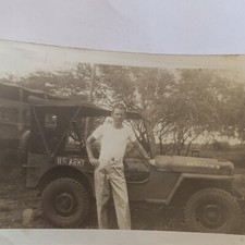 Found Black White Photo Youmg Military Man Posing in Front of Army Truck