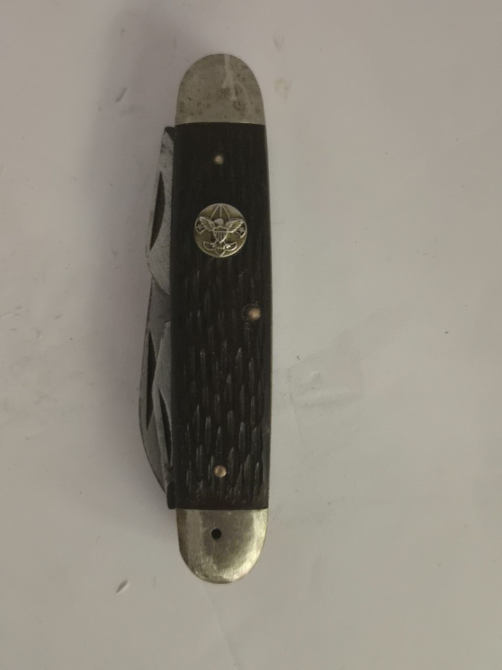 An official Ulster USA Boy Scout 4-blade folding knife — a piece of mid-century Americana that's as much a collectible badge of nostalgia as it is a functional camp tool.