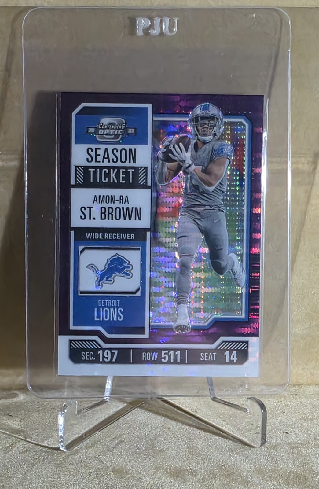 2023 Contenders Optic Season Ticket 16 Amon-Ra St. Brown Purple Pulsar Prizm /26