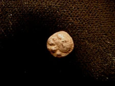IONIA. 6th-5th Cent BC. TRIHEMITARTEMORION. Lion's head. Bird. Minuscule coin.