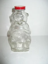 VINTAGE 7 1/4" SNOW CREST BEVERAGES SALEM MASS CLEAR GLASS BEAR BOTTLE BANK 