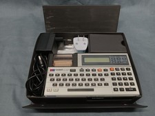 CASIO FX-820P Personal Computer With Charger Case and Manuals FULLY FUNCTIONAL 