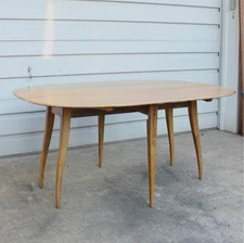 Heywood Wakefield MCM Solid Maple Spider Leg Drop Leaf Dining Table, 1950s